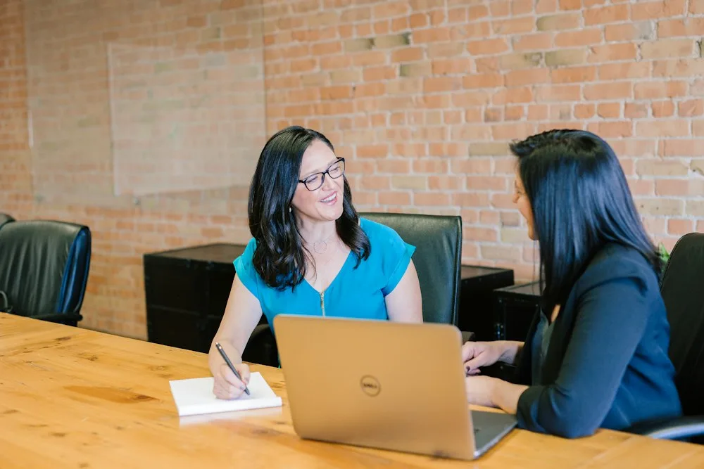 Executive team reviewing performance analytics